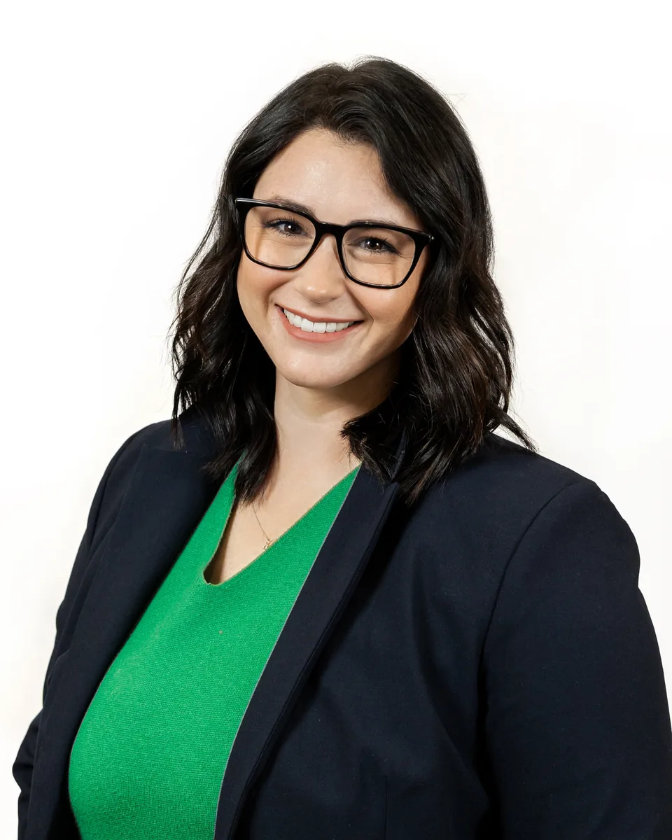 Corporate headshot with gray background