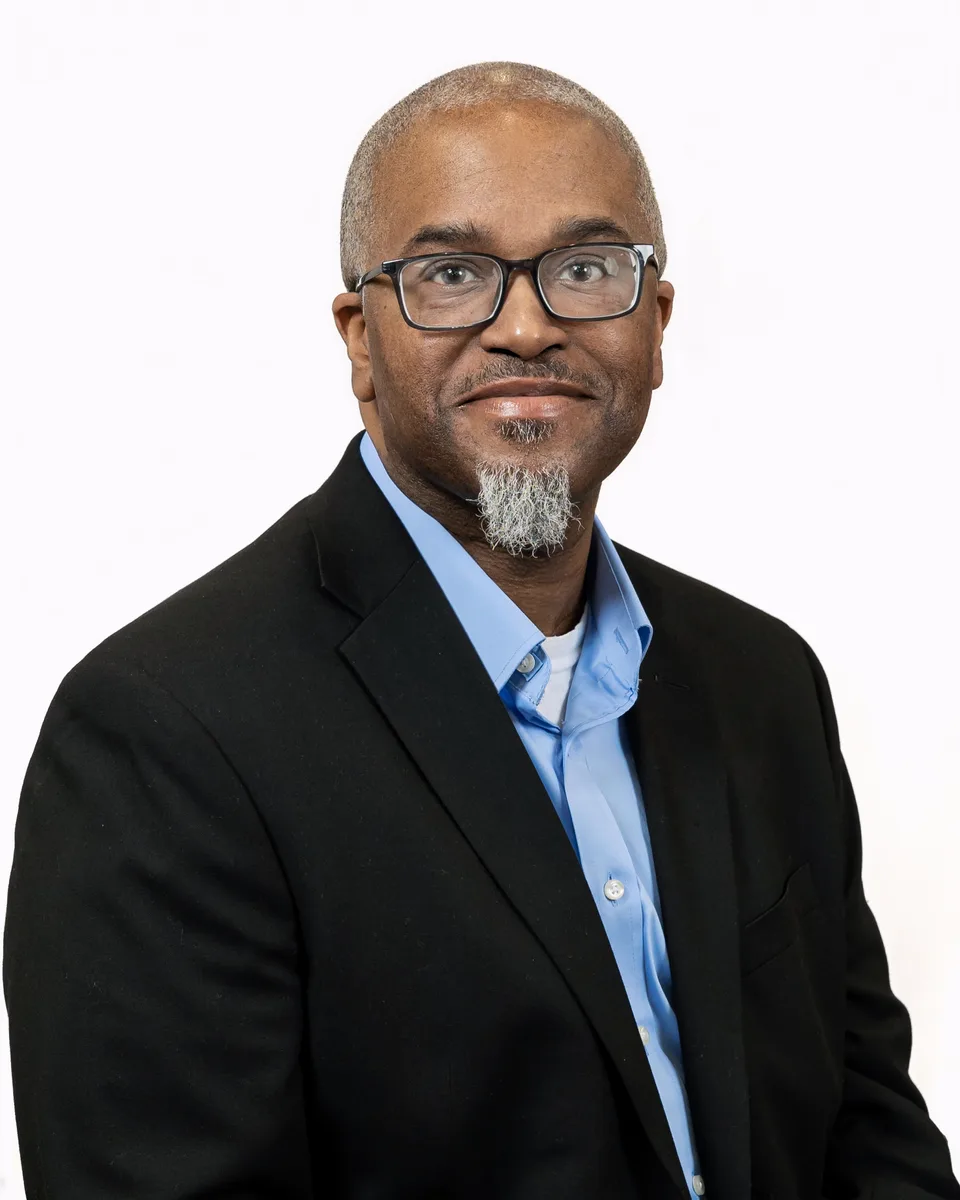 Professional portrait with natural backdrop