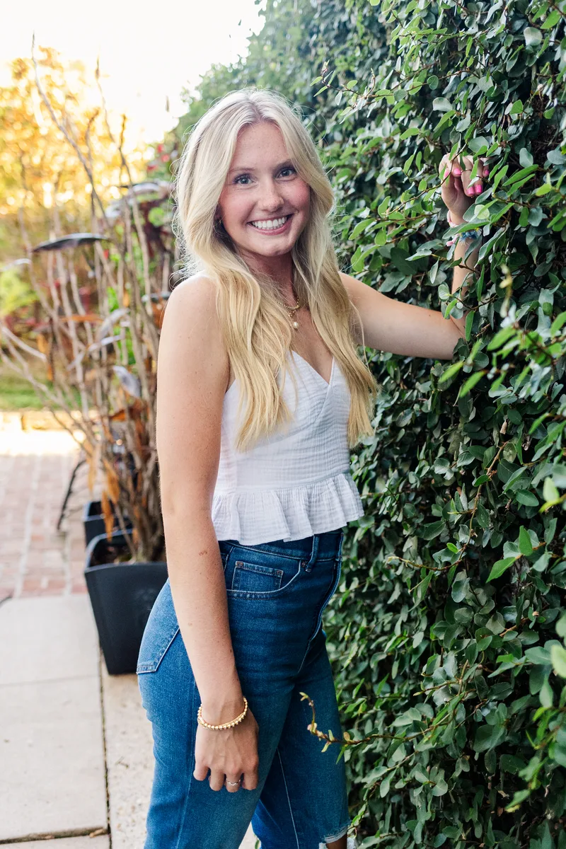 Senior portrait outdoors with warm tones