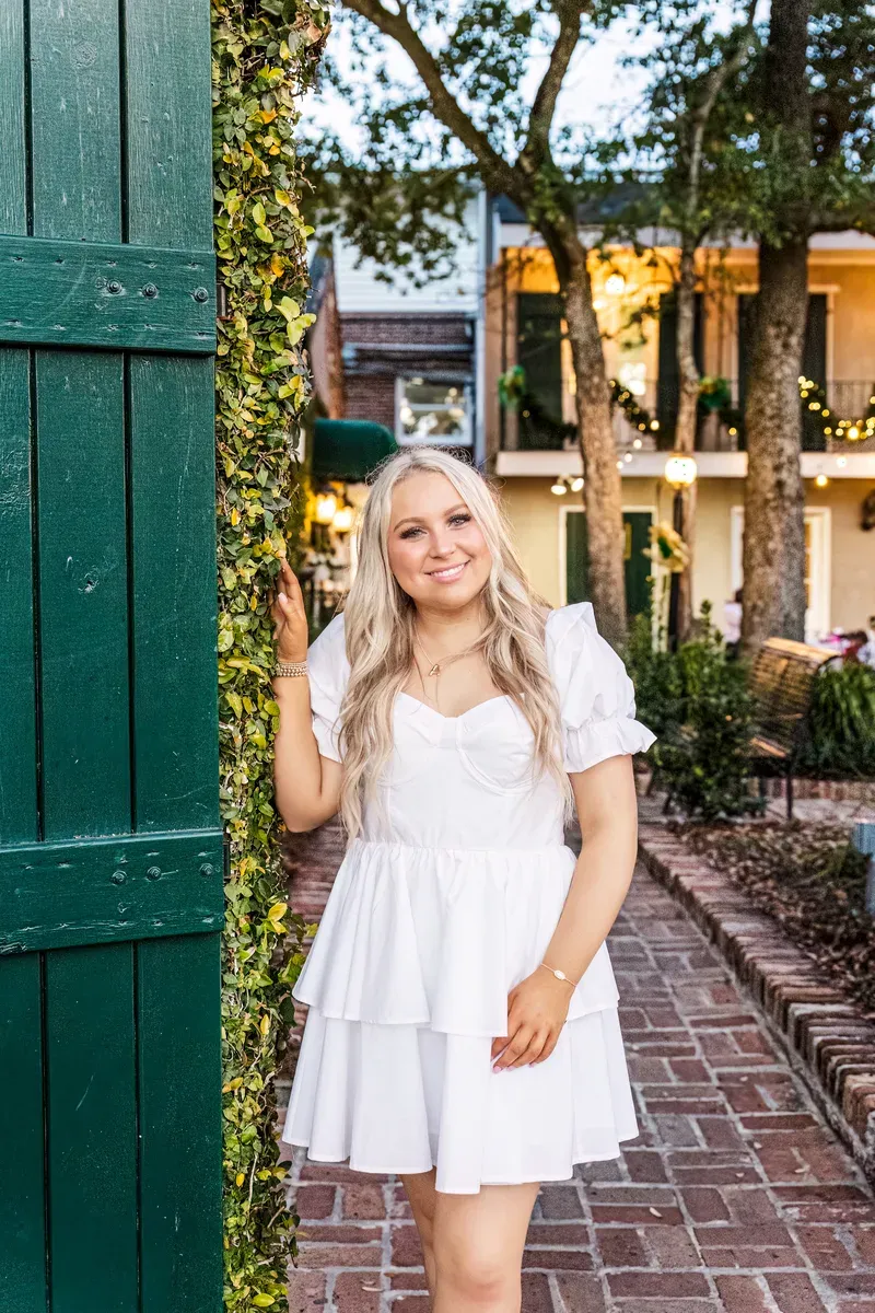 Senior portrait with expressive pose
