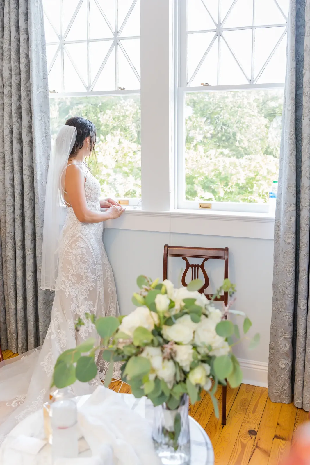 Bride by window with natural light