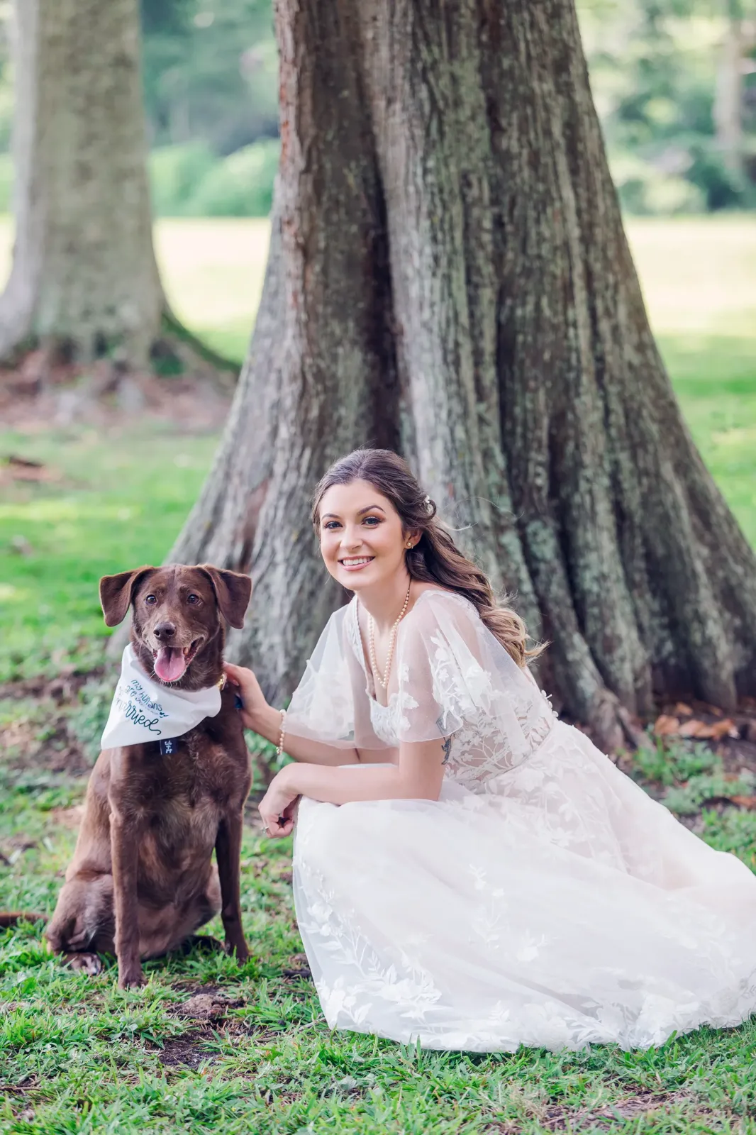 Bride with her dog on wedding day
